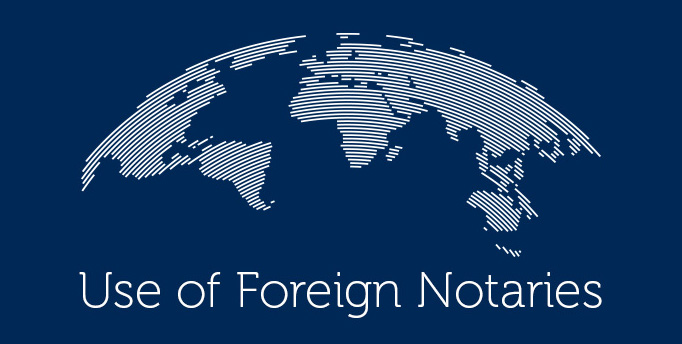 an image of a curved world map with the text "Use of Foreign Notaries"